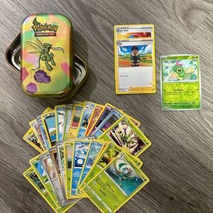27 Card Pokemon Bundle with Tin  and Reverse Holo and 2 Rares